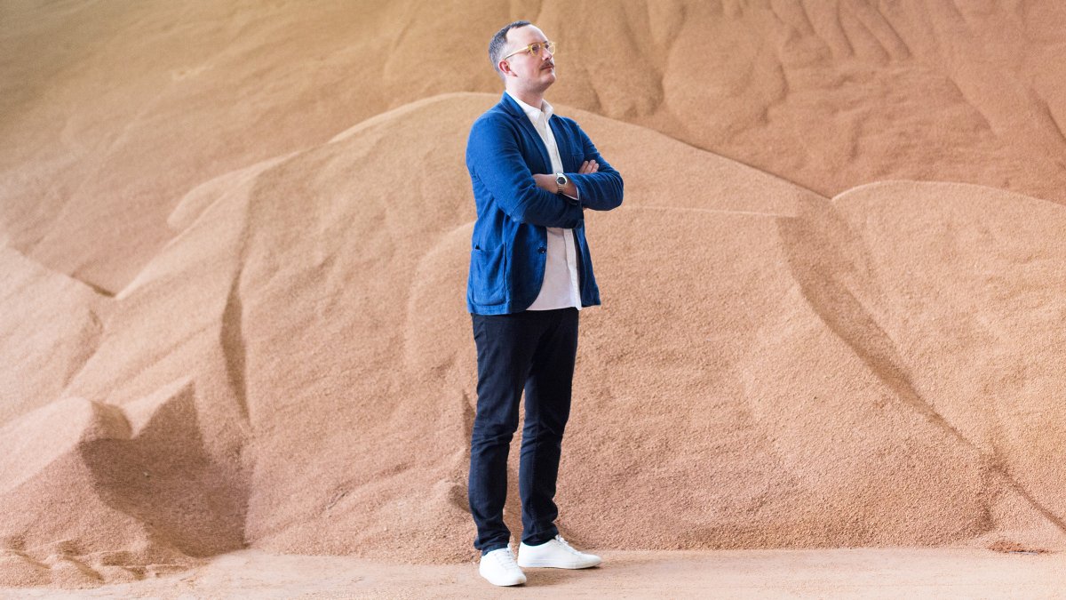 Lars in front of cork piles