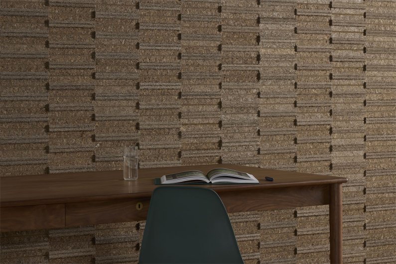 Fragments behind desk and green chair